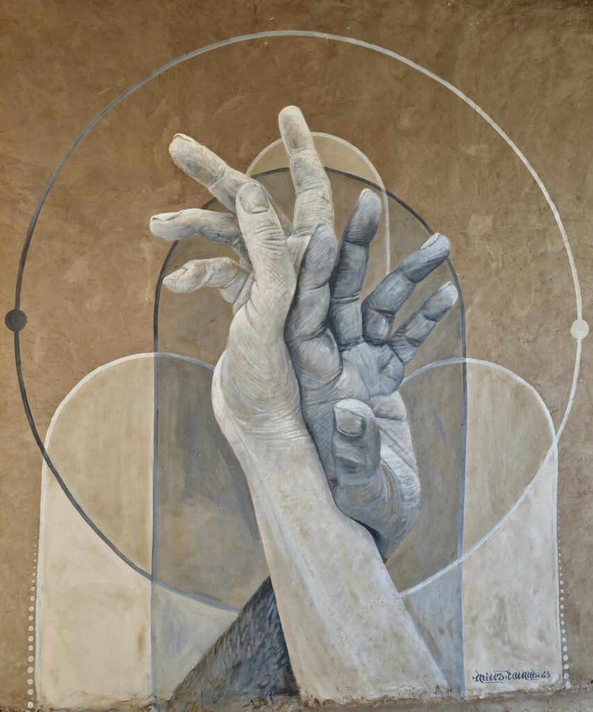 Mural of 2 hands made in chalk and charcoal